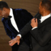 (FILES) In this file photo taken on March 27, 2022 US actor Will Smith (R) slaps US actor Chris Rock onstage during the 94th Oscars at the Dolby Theatre in Hollywood, California. - Chris Rock finally hit back at Will Smith on March 4, 2023 in a brutal stand-up routine, a year after the actor slapped him in front of a global TV audience for the Oscars. (Photo by Robyn Beck / AFP)