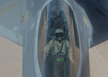 A U.S. Air Force F-22 Raptor pilot flies while his aircraft is refueled by a KC-135 Stratotanker above Southwest Asia June 21, 2017. The F-22, a component of the Global Strike Task Force, supports U.S. and coalition forces working to liberate territory and people under the control of ISIS. (U.S. Air Force photo by Staff Sgt. Trevor T. McBride)