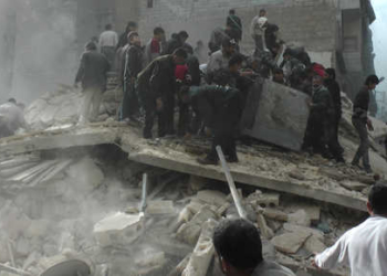 Syrians from a neighborhood in the northern city of Aleppo search for survivors under the rubble of a collapsed building on March 5, 2014, after a barrel bomb was reportedly dropped by Syrian government forces. Syrian government forces are waging a campaign of siege warfare and starvation against civilians as part of its military strategy, a UN-mandated probe said. The commission, which includes legendary former war crimes prosecutor Carla del Ponte, stressed that more than 250,000 people remain besieged in war-ravaged country. AFP PHOTO/BARAA AL-HALABI (Photo by BARAA AL-HALABI / AFP)