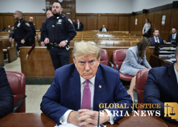 Former President Donald Trump sits at a hearing for his hush money trial in early 2024.