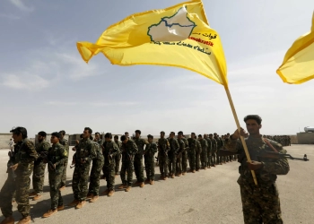 Members of the Syrian Democratic Forces(SDF), a US-backed force, participate in graduation ceremony. AFP Photo