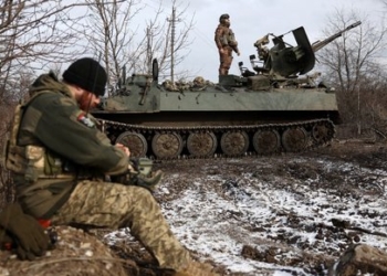 Ukrainian anti-aircraft gunners of the 93rd Separate Mechanized Brigade Kholodny Yar monitor the sky from their positions in the direction of Bakhmut in the Donetsk region, amid the Russian invasion of Ukraine, on February 20, 2024. (Photo by Anatolii STEPANOV / AFP)