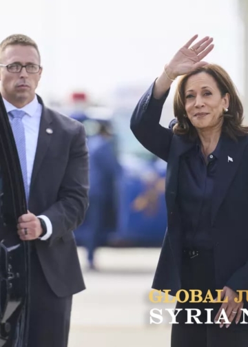 Vice President Harris waves after landing in Flint, Mich., on Oct. 4.