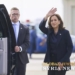 Vice President Harris waves after landing in Flint, Mich., on Oct. 4.